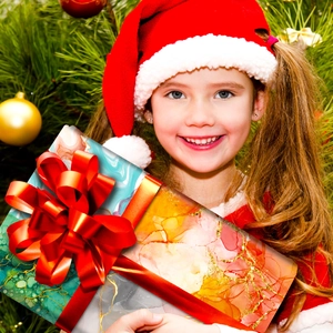 Detailed gift box featuring marble patterns and a vibrant red silk ribbon bow decoration