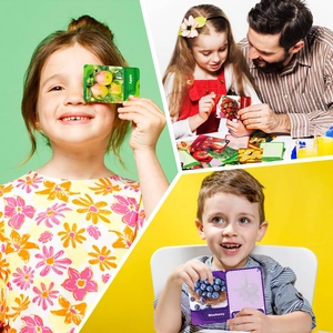 Parent-child interaction showing educational fruit flashcards with realistic photography