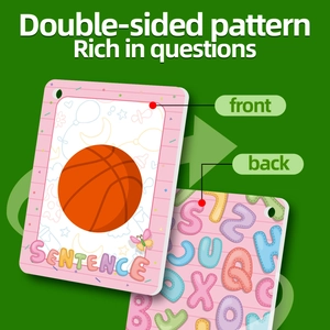 Close-up of double-sided educational flashcards for children showing letters and patterns