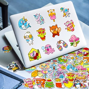 Cute cartoon animal and astronaut waterproof stickers applied on a silver laptop