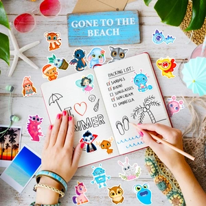 DIY journal scene with cute animal waterproof stickers on a summer beach background
