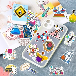 Macro shot of 50 science themed lab stickers on a phone case and textured background
