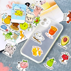 Macro shot of waterproof cartoon puns stickers on phone case and textured surface