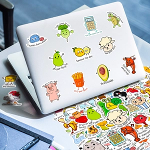 Close-up of cute cartoon animal and food pun stickers applied on a silver laptop lid