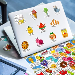 Close-up of cute animal pun stickers decorating a laptop lid with vivid colors