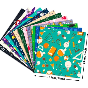 12-pack science themed scrapbooking paper featuring microscopes and lab patterns, 6-inch size