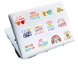 50 pieces of colorful inspirational stickers set on a silver laptop surface