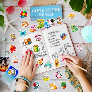 Cute waterproof cartoon stickers for journal decoration on a bright wooden desk