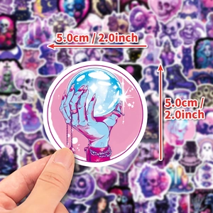 Purple gothic sticker with glowing crystal ball design measuring 2.0 inches in diameter