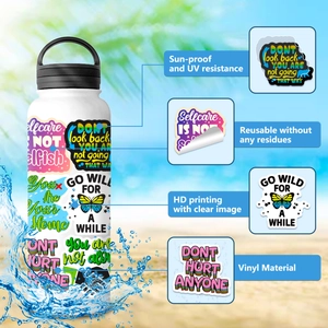 Detail of waterproof vinyl stickers with motivational quotes on a white sports bottle