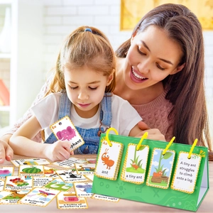 Close-up of English word flashcards with a green desktop stand for kids learning