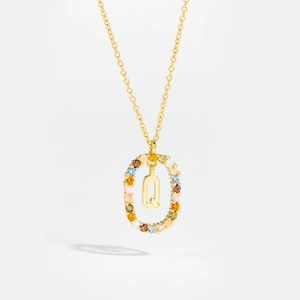 Detailed view of 18K gold necklace with letter Q pendant and multi-color zircon stones