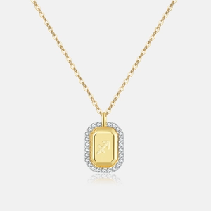 Detail of S925 silver gold Sagittarius pendant with white zircon stones on link chain