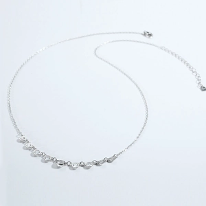 Close-up of S925 sterling silver stamp on a necklace with lobster clasp and extension chain