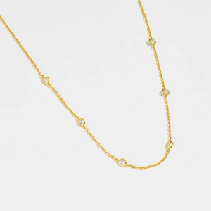 Elegant S925 silver gold-plated necklace featuring 6 round bezel-set crystals for women