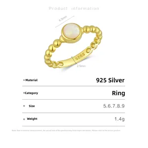 Detail view of 925 silver golden ring with 6.5mm opal stone and size specifications
