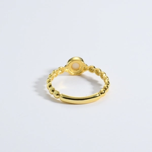 Vintage golden chain ring for women featuring a round cat-eye stone and beaded texture