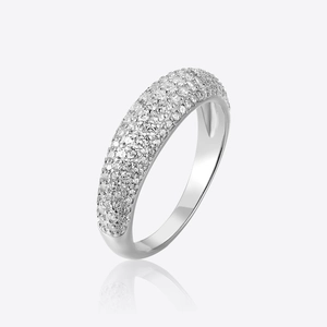 Macro shot of silver paved cubic zirconia ring with micro-set stones and polished band