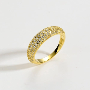 Detailed close-up of S925 sterling silver gold ring with multi-row cubic zirconia stones