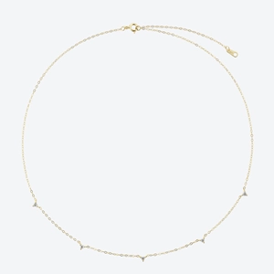 Detailed view of S925 sterling silver gold necklace with five small cubic zirconia pendants