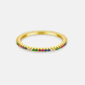 Close-up of a gold ring featuring a rainbow of multi-colored zircon stones
