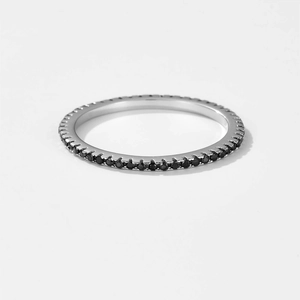 Macro shot of polished S925 silver ring featuring full black zircon gemstone pavé setting