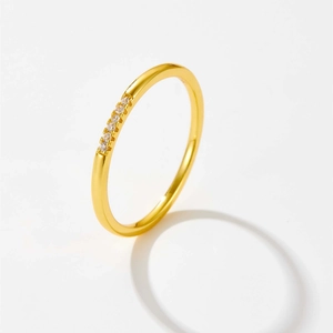 Elegant gold S925 silver thin ring featuring six sparkling cubic zirconia stones