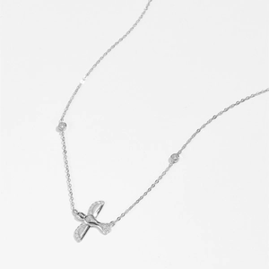 Elegant 925 sterling silver thunderbird necklace with sparkling pavé stones on white background
