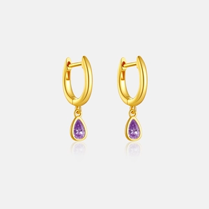 Detailed macro view of S925 silver gold hoop earrings with teardrop purple zircon