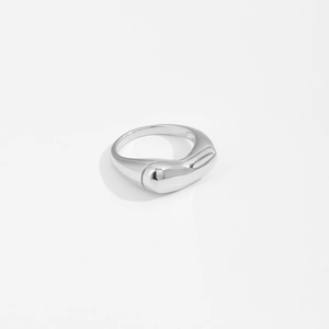 Minimalist irregular fluid silver ring with mirror finish on a clean white background