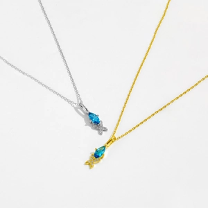 Elegant s925 silver fish necklace with blue marquise gemstone in gold and silver finish