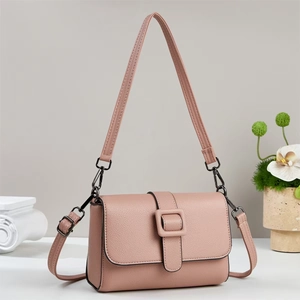 Elegant mauve pebble leather crossbody bag with square buckle decoration and orchid decor