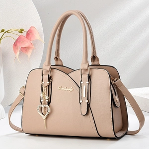 Sac à main élégant abricot de grande capacité avec pendentif coeur et bandoulière