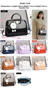 Glossy diamond pattern handbag with pompom charm and metal handle in various colors