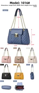 Detailed view of quilted chain bag showing 32x21cm dimensions and interior compartments