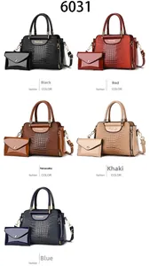 Detail view of crocodile pattern faux leather handbag set in five assorted colors