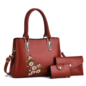 Ensemble de sacs en cuir bordeaux de trois pièces avec broderie florale et détails dorés