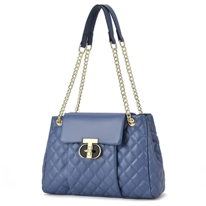 Detail of grey-blue quilted leather bag featuring a gold dual-ring lock and chain strap