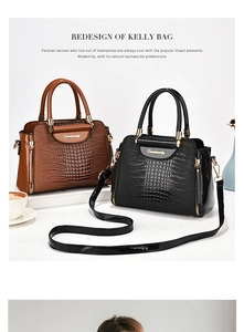 Detail view of crocodile pattern leather handbags with gold hardware in black and brown