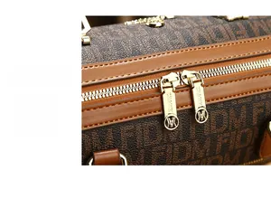 Macro detail of high-quality golden double zipper on retro monogram handbag