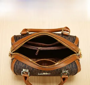 Internal view of the Boston bag showing a spacious compartment and zipper pockets