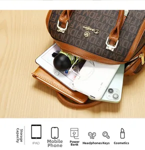 Top view of brown Boston bag interior showing space for iPad, phone, and daily essentials