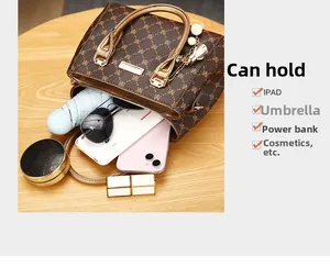 Top view of brown monogram tote bag showing spacious interior for iPad and daily essentials