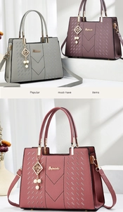 Detail von Taschen aus Leder mit Litschimuster in Grau, Lila und Rosarot mit Perlen