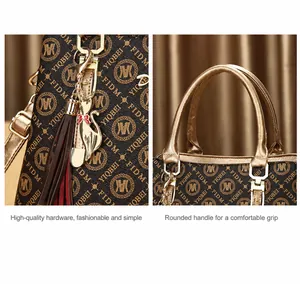 Detailed view of the brown monogram tote bag with golden cat charm and tassel