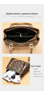Detailed view of the printed handbag interior showing compartments for iPad and umbrella