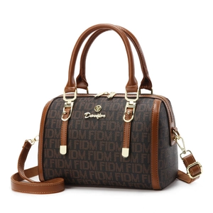 Classic Boston handbag with FIDM monogram pattern and brown leather straps for women