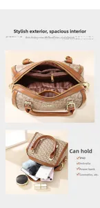 Interior detail of Boston handbag showing large capacity for iPad and daily essentials