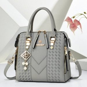 Grey pearl pendant handbag with woven texture and adjustable shoulder strap for women