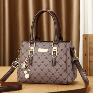 Brown monogram tote bag with gold chain pearl charm and adjustable shoulder strap